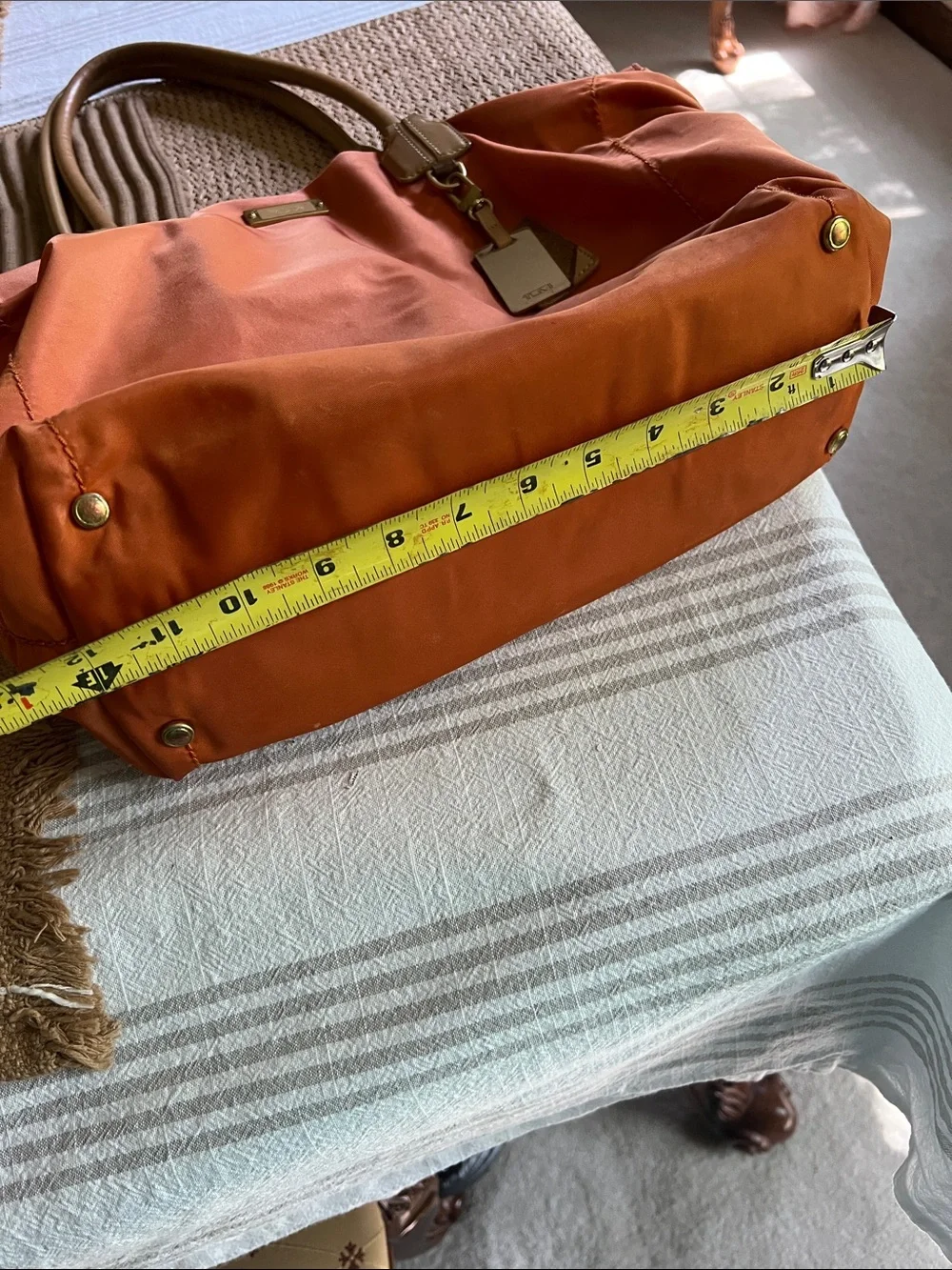 Tumi Orange Nylon Tote with Tan Leather Handles. Pre owned.